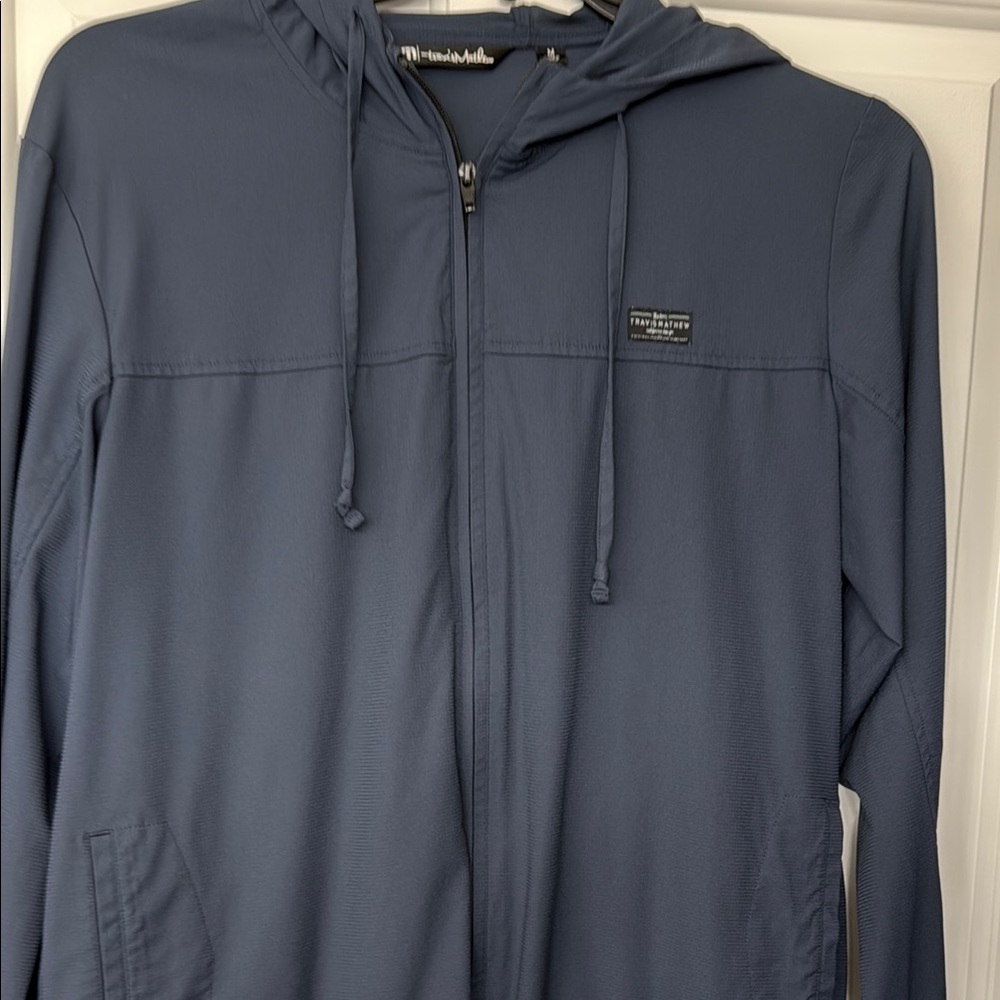 Travis Mathew’s  Men's Blue Hooded Jacket